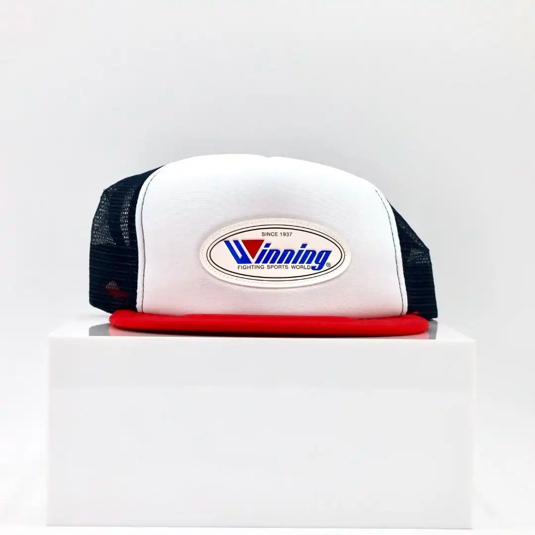 Winning CP-1 mesh cap in navy, red, and white