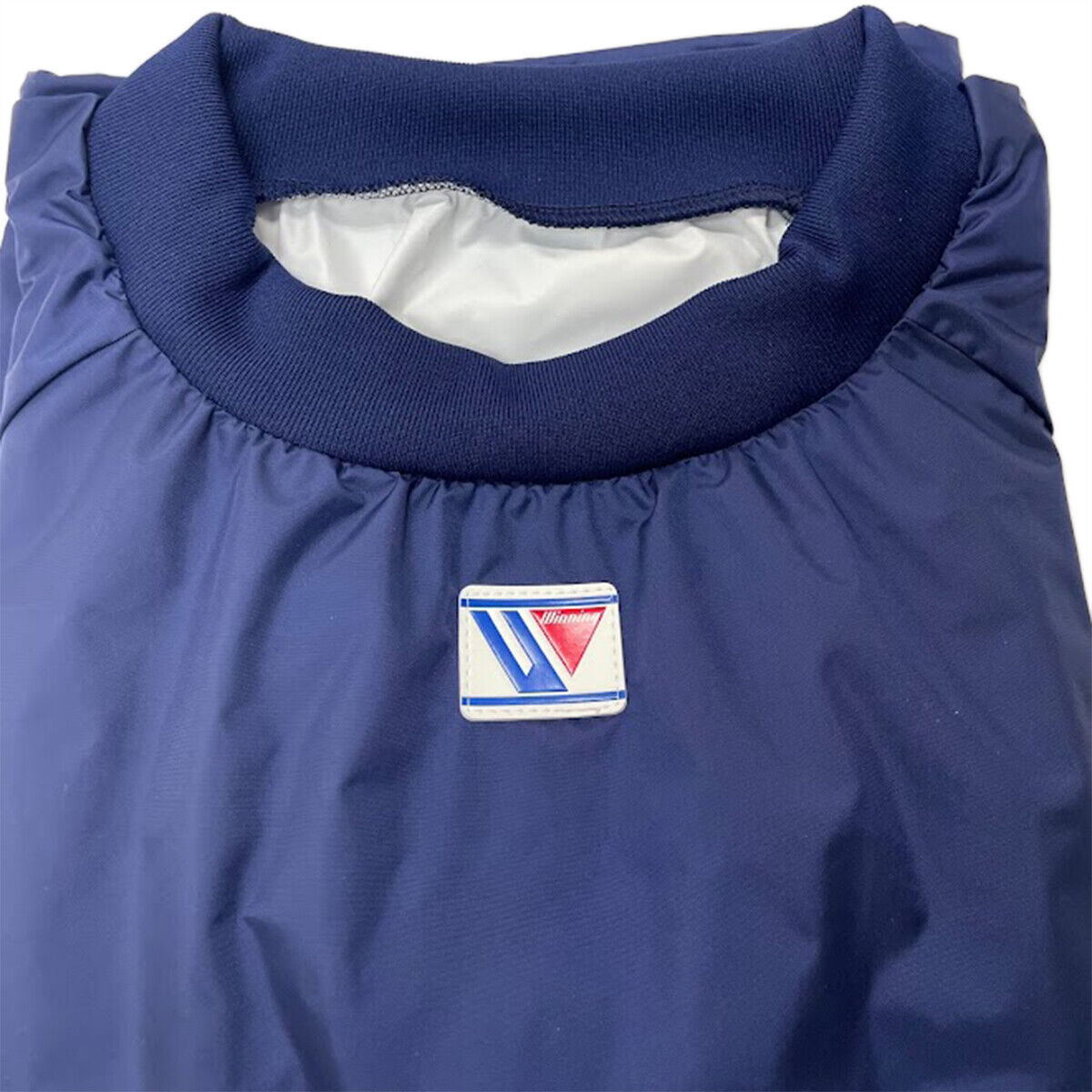 Winning F-77 navy sauna suit - worn front view
